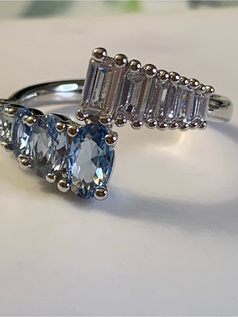 Sterling Silver Light Blue Topaz and CZ Bypass Ring